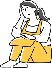 頭を抱えて悩む女性