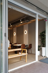 Obraz premium Interior design and decoration of coffee cafe decorated with wooden furniture