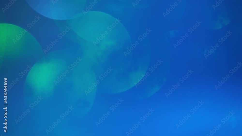 Canvas Prints large green bokeh motion on blue background. abstract colorful christmas bokeh background. defocused
