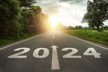 New year 2024 or straightforward concept. Text 2024 written on the road in the middle of asphalt...