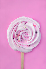 Lollipop candy on pink
