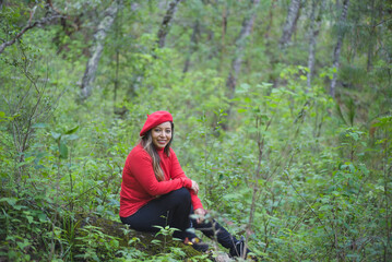 Woman with a positive attitude admiring the forest.