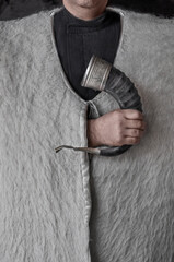 georgian man in national woolen clothes shepherds burka with drinking horn in hand