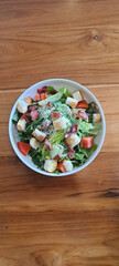 Cesar salad in white plate