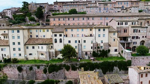 Fly Over Hill Town Of Assisi In The Province Of Perugia, Umbria Region, Italy. Aerial Drone Shot