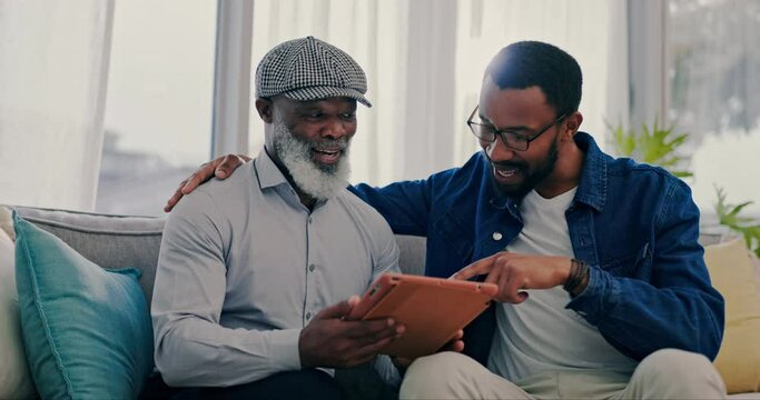 Home, talking and father with son, tablet or conversation with planning, discussion or social media. Explain, dad or black men on a couch, technology or apartment with network, family or website info