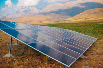Solar panel on the background of mountains. sustainable development of new energy in agriculture.