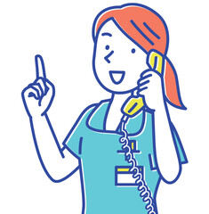 指差ししながら電話で対応する若い女性看護師
