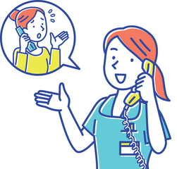 指差ししながら電話で対応する若い女性看護師