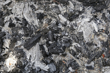 Ashes texture background. Burnt wood ash background in after barbecue, close up