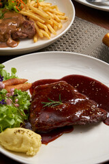 Pork tenderloin steak with red wine 