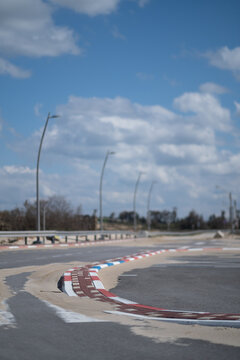 During winter, the low season, the parking lot at Zikim Beach is empty except for accumulated sand that has blown onto the asphalt.