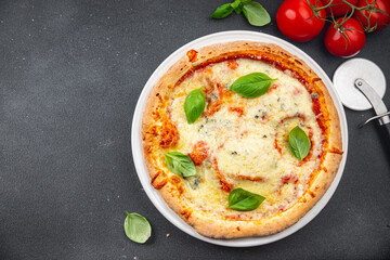 pizza four cheeses mozzarella, gorgonzola, parmesan, emmental cheese portioned slice ready to eat appetizer meal food snack on the table copy space food background rustic top view
