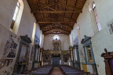 Lucignano, Italy - 23 of May 2022: inside church "Collegiata di San Michele Arcangelo" in small historic town Lucignano in Tuscany, Italy.