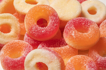 Gummy rings with sugar background. Close up