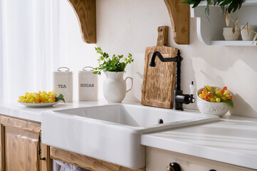 ceramic sink and water tap in retro style at kitchen