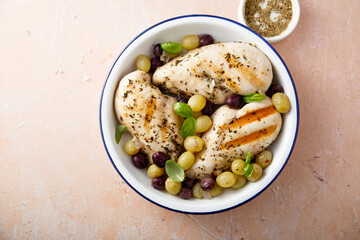 Grilled chicken with grape and basil
