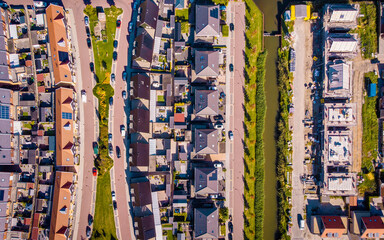 Dutch Suburban area with modern family houses, newly build modern family homes in the Netherlands,...