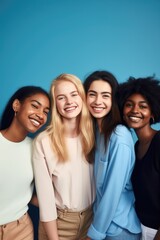 Obraz premium studio shot of a group of friends standing together against a blue background