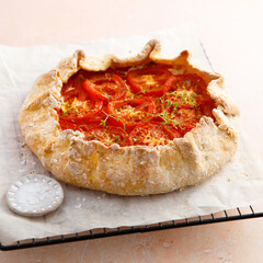 Homemade tomato galette with herbs