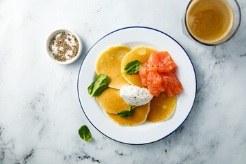 Savory pancakes with salmon and cream cheese