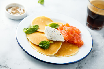 Savory pancakes with salmon and cream cheese