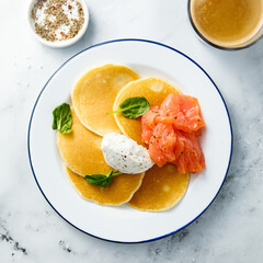 Savory pancakes with salmon and cream cheese