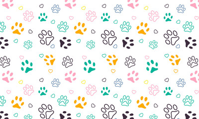 Vector seamless pattern with cat or dog footprints. Cute colorful print.
