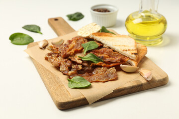 Tasty breakfast and delicious meat food concept - fried bacon