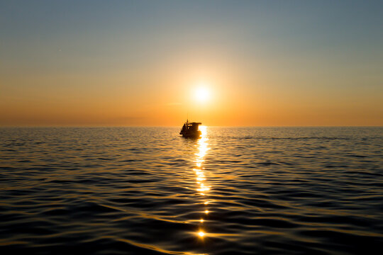 Ferry boat silhouette with passengers