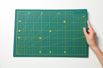 Patchwork accessories concept on white background, cutting mat