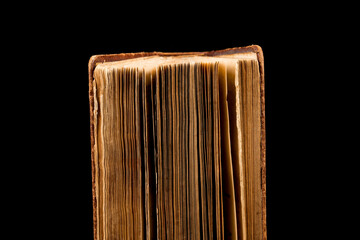 ancient book shot on black background
