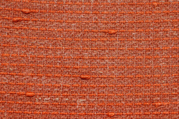 texture of old red fabric closeup