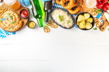  Oktoberfest munich traditional festival menu foods - bavarian sausages, pretzels, potato, sauerkraut, beer bottle and mug,  Background flyer for Oktoberfest invitation on old wooden table