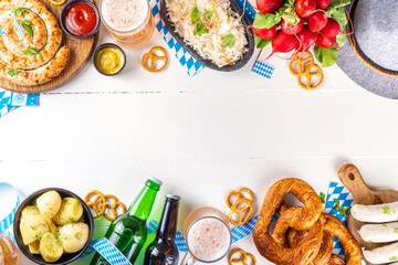  Oktoberfest munich traditional festival menu foods - bavarian sausages, pretzels, potato, sauerkraut, beer bottle and mug,  Background flyer for Oktoberfest invitation on old wooden table