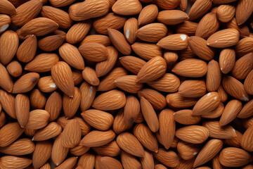 Top view of almond nuts background texture