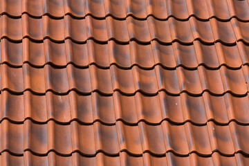 Red tiles roof background
