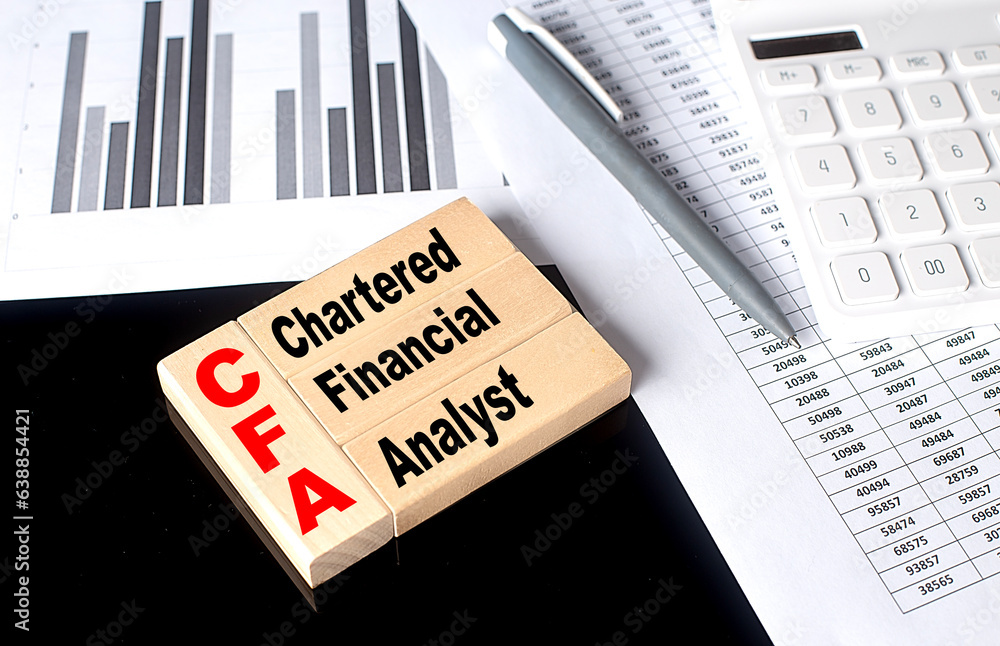 Poster word cfa made with wood building blocks with chart and calculator