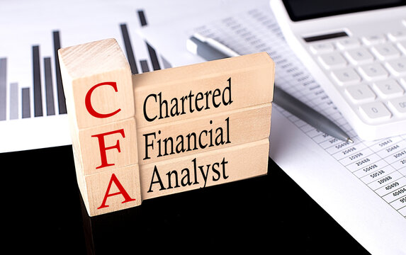 Word CFA made with wood building blocks, business concept