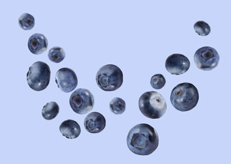 Many ripe blueberries falling on color background