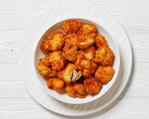 crispy fried panko breaded chicken bites in bowl