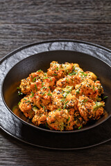 bang bang broccoli bites in bowl, top view
