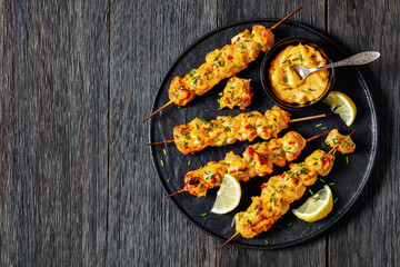Bang Bang Chicken Skewers on plate, top view