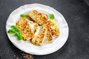 halloumi fried cheese fresh basil meal food snack on the table copy space food background rustic top view