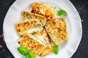 halloumi fried cheese fresh basil meal food snack on the table copy space food background rustic top view