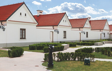 Row of modestly monks' houses in Camaldolese monastery in Wigry village, Poland