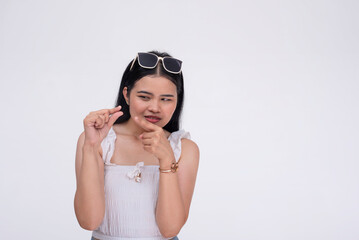 A mean young asian woman belittling the size of your package. Mocking gesture with fingers....