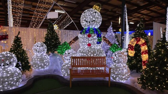 Huge illuminated SNOW MAN FAMILY made of LED lights. Christmas Light decorations