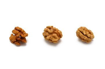 Peeled walnut kernels isolated on white background