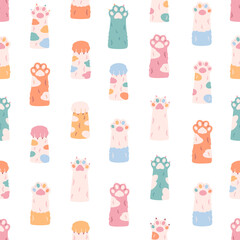 Cute colorful cats paws seamless pattern. Different funny pet paws with claws, animals hands. Vector illustration in flat style